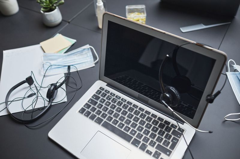 Computer technician diagnosing a laptop for BNT PC Repair in Jacksonville, FL