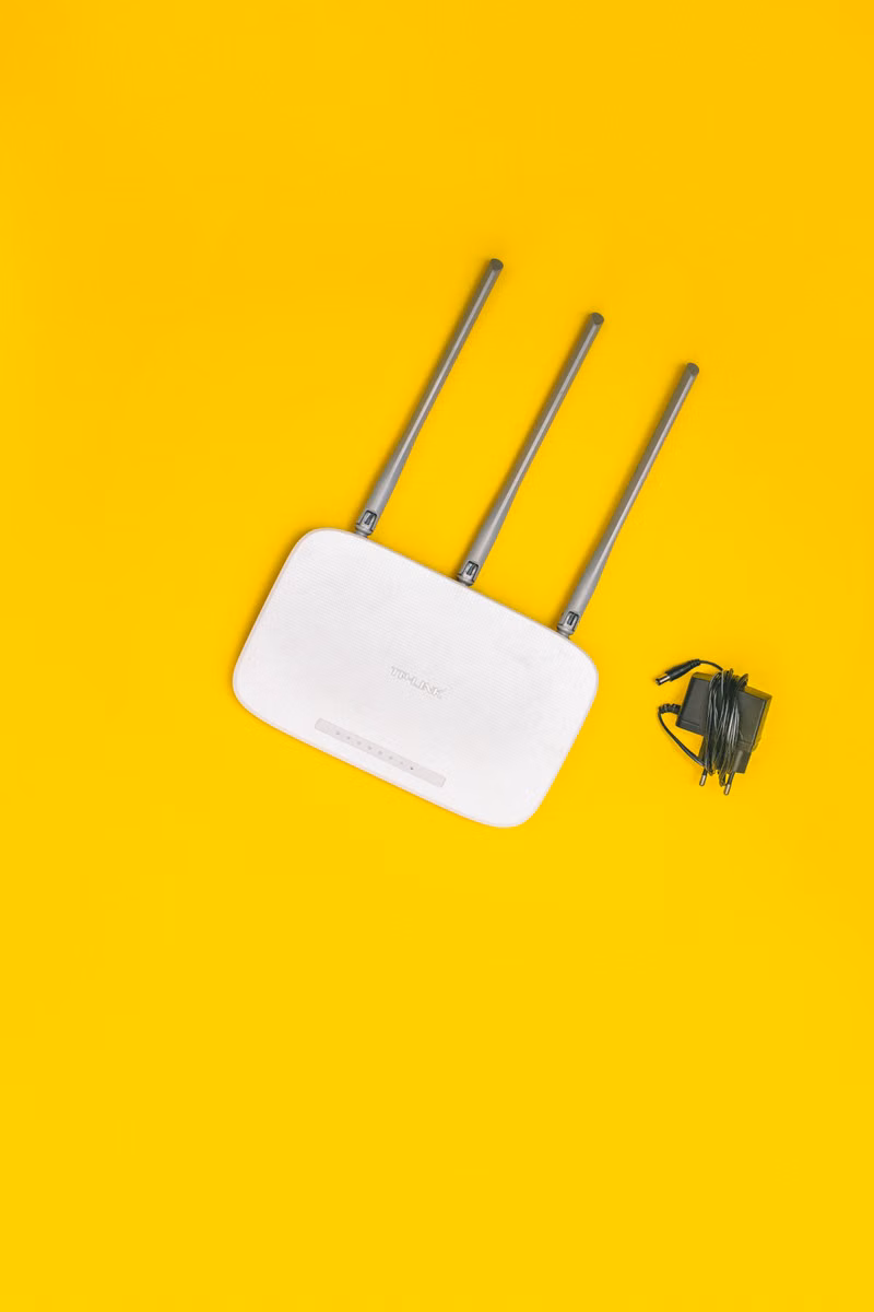 Wi-Fi router and network equipment being checked in a home office
